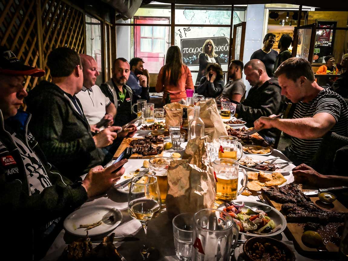 Riders dinner , table full of traditional dishes
